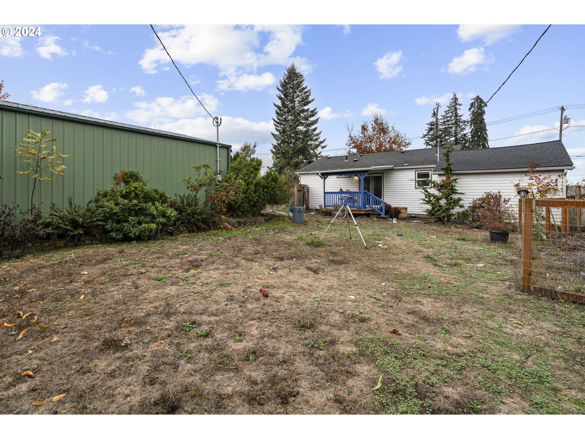 1275 30th Street Springfield, OR 97478 - Photo 27 of 28 a view of a backyard with plants and a patio