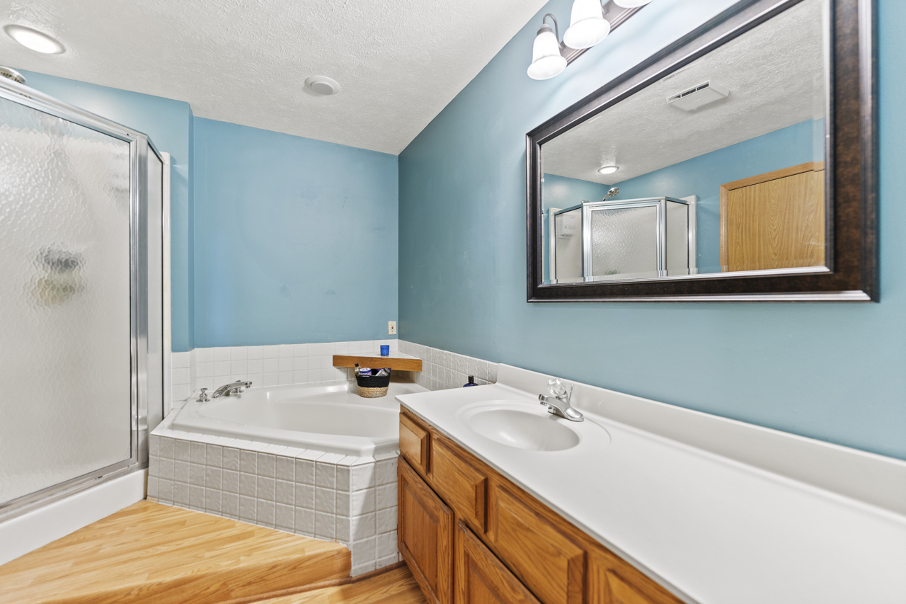 1506 Pier Drive Davis, IL 61019 - Photo 17 of 47 a bathroom with a sink and a bathtub