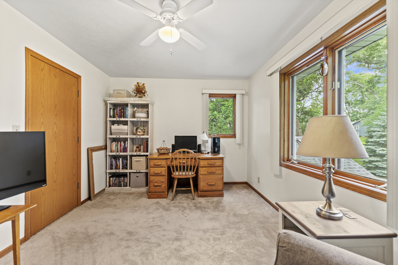 1506 Pier Drive Davis, IL 61019 - Photo 20 of 47 a work room with furniture and a flat screen tv