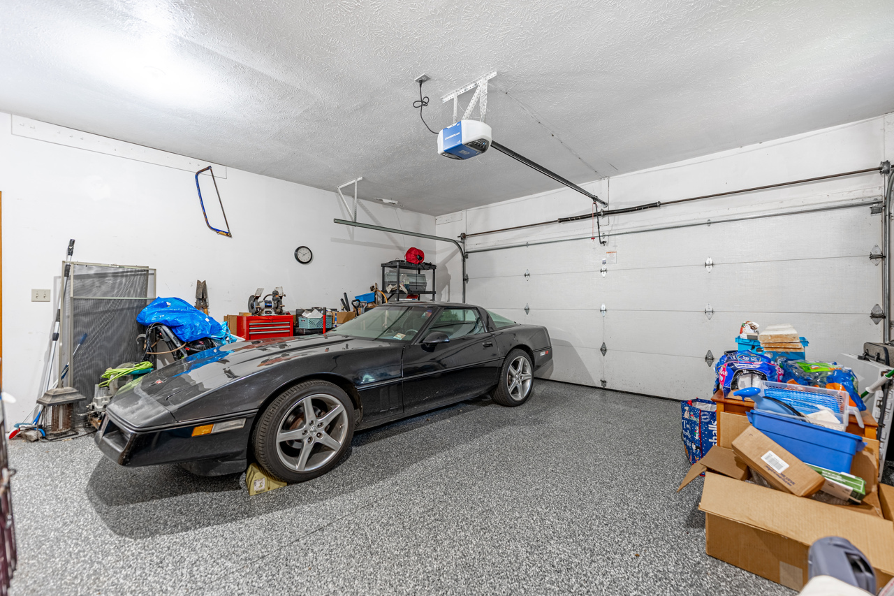 1506 Pier Drive Davis, IL 61019 - Photo 33 of 47 a car and bike parked in a garage