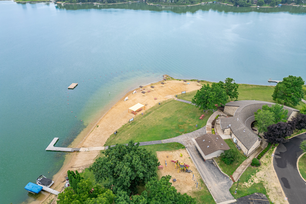 1506 Pier Drive Davis, IL 61019 - Photo 41 of 47 an aerial view of a house with a yard and lake view
