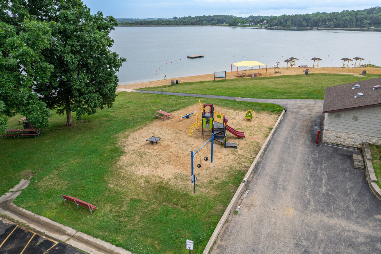 1506 Pier Drive Davis, IL 61019 - Photo 42 of 47 an aerial view of a house with a yard and lake view