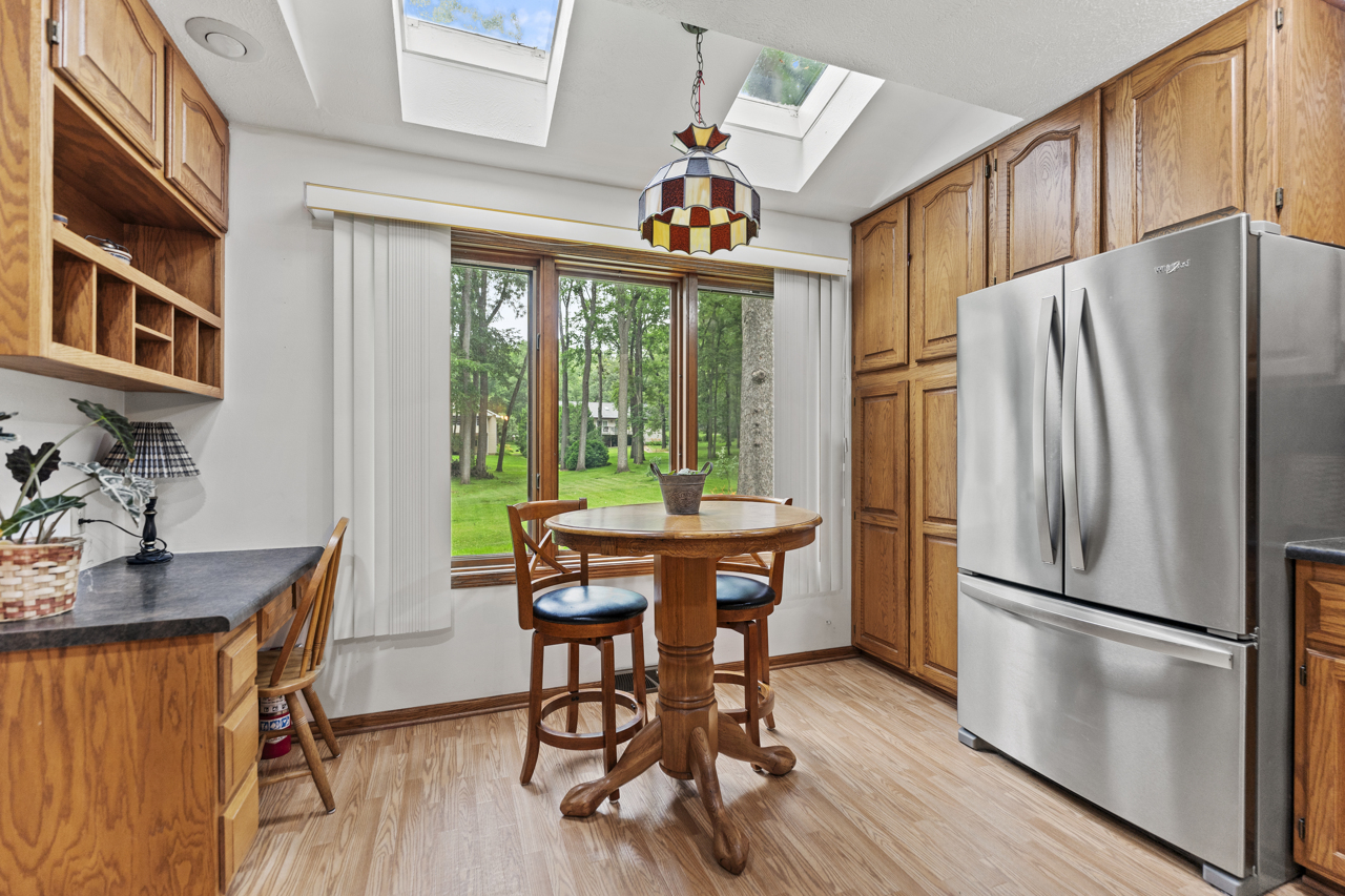 1506 Pier Drive Davis, IL 61019 - Photo 9 of 47 a view of a dining room with furniture window and wooden floor