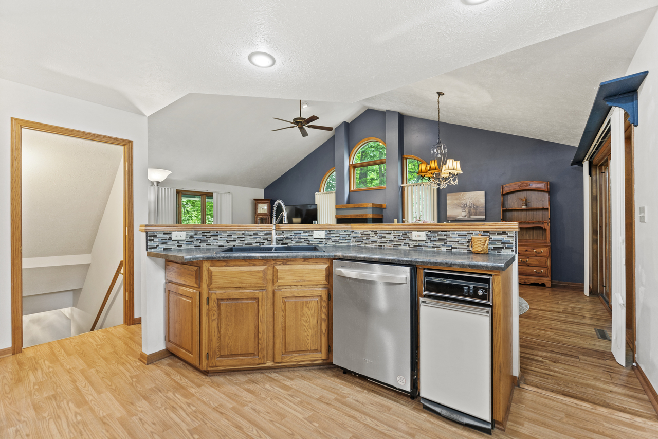 1506 Pier Drive Davis, IL 61019 - Photo 10 of 47 a kitchen with stainless steel appliances granite countertop a stove and a sink
