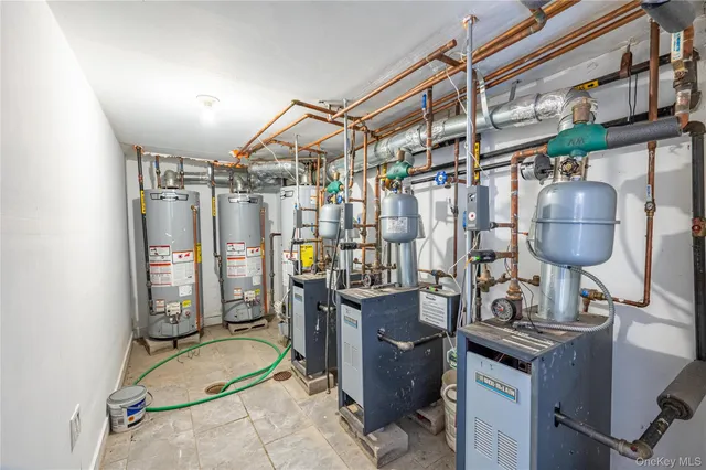 a kitchen with stainless steel appliances granite countertop a sink and a stove