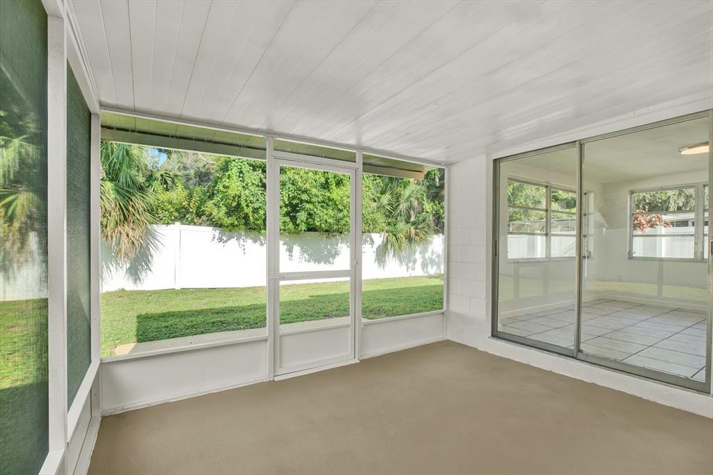 6701 Parkside Drive New Port Richey, FL 34653 - Photo 16 of 26 a view of a room with window and an outdoor view