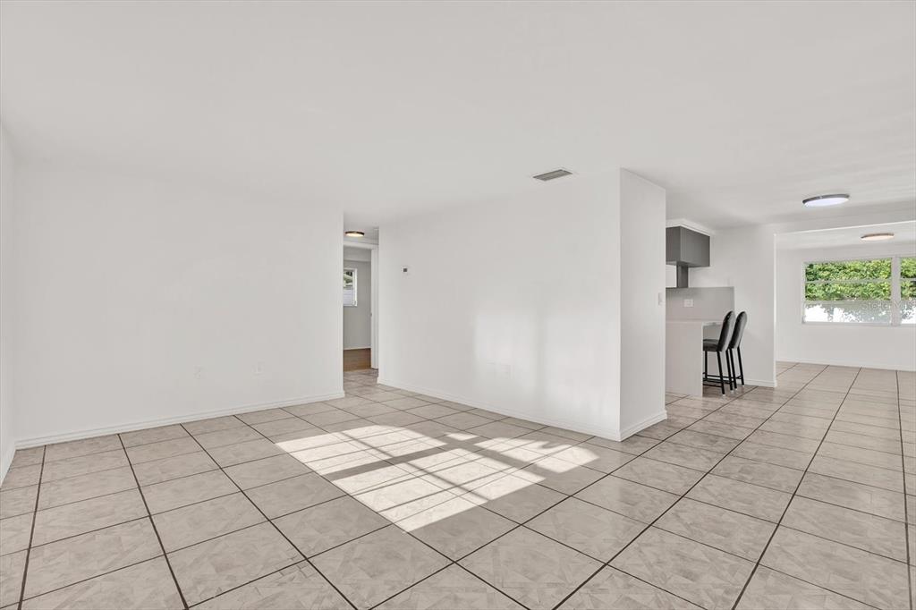 6701 Parkside Drive New Port Richey, FL 34653 - Photo 2 of 26 a view of an empty room and window