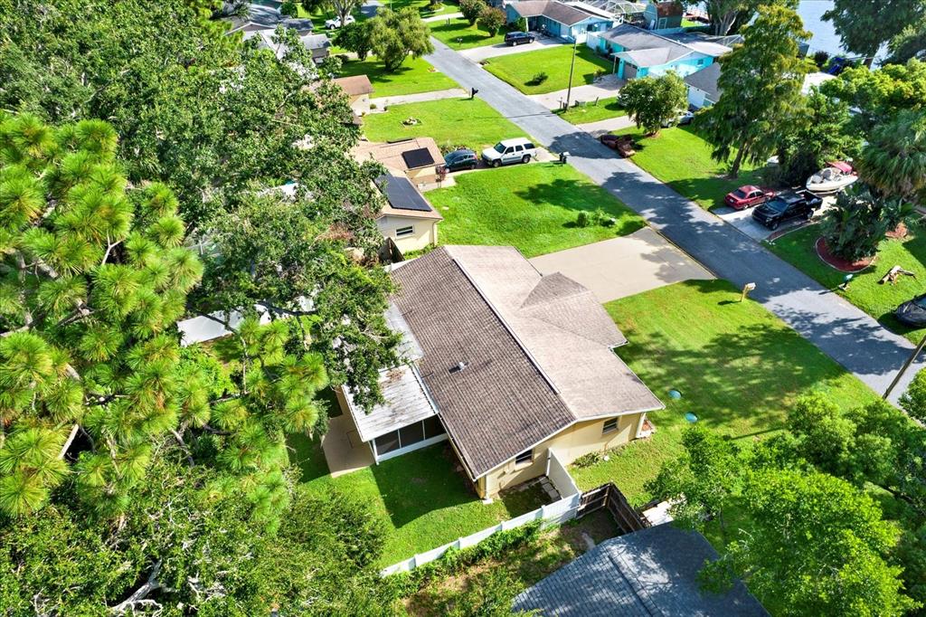 6701 Parkside Drive New Port Richey, FL 34653 - Photo 22 of 26 an aerial view of a house with yard swimming pool and outdoor seating