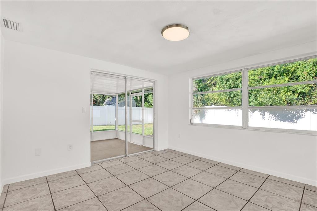 6701 Parkside Drive New Port Richey, FL 34653 - Photo 7 of 26 an empty room with windows
