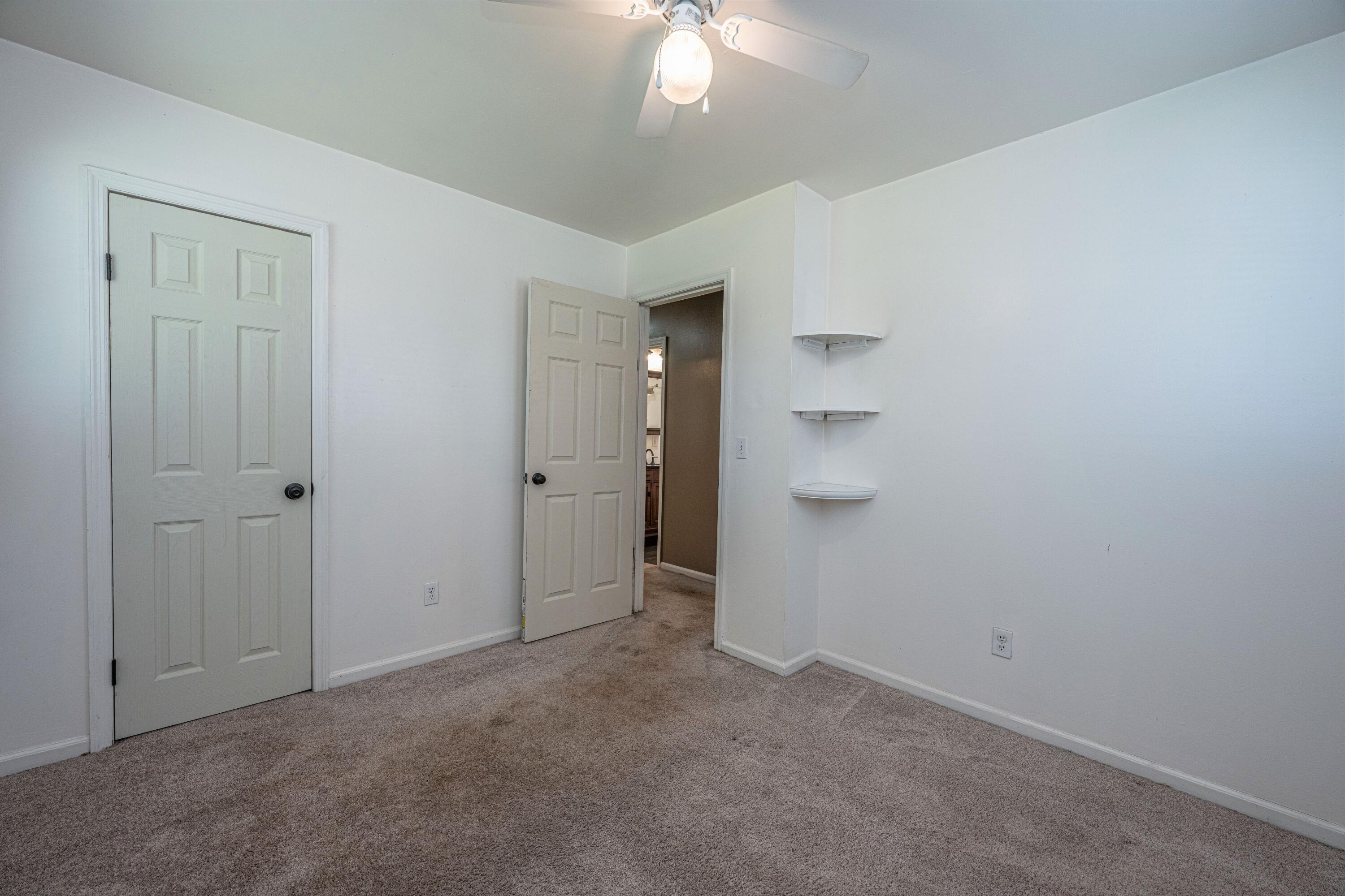 915 Miles Jamison Road Summerville, SC 29485 - Photo 23 of 34 Spare bedroom with shelves