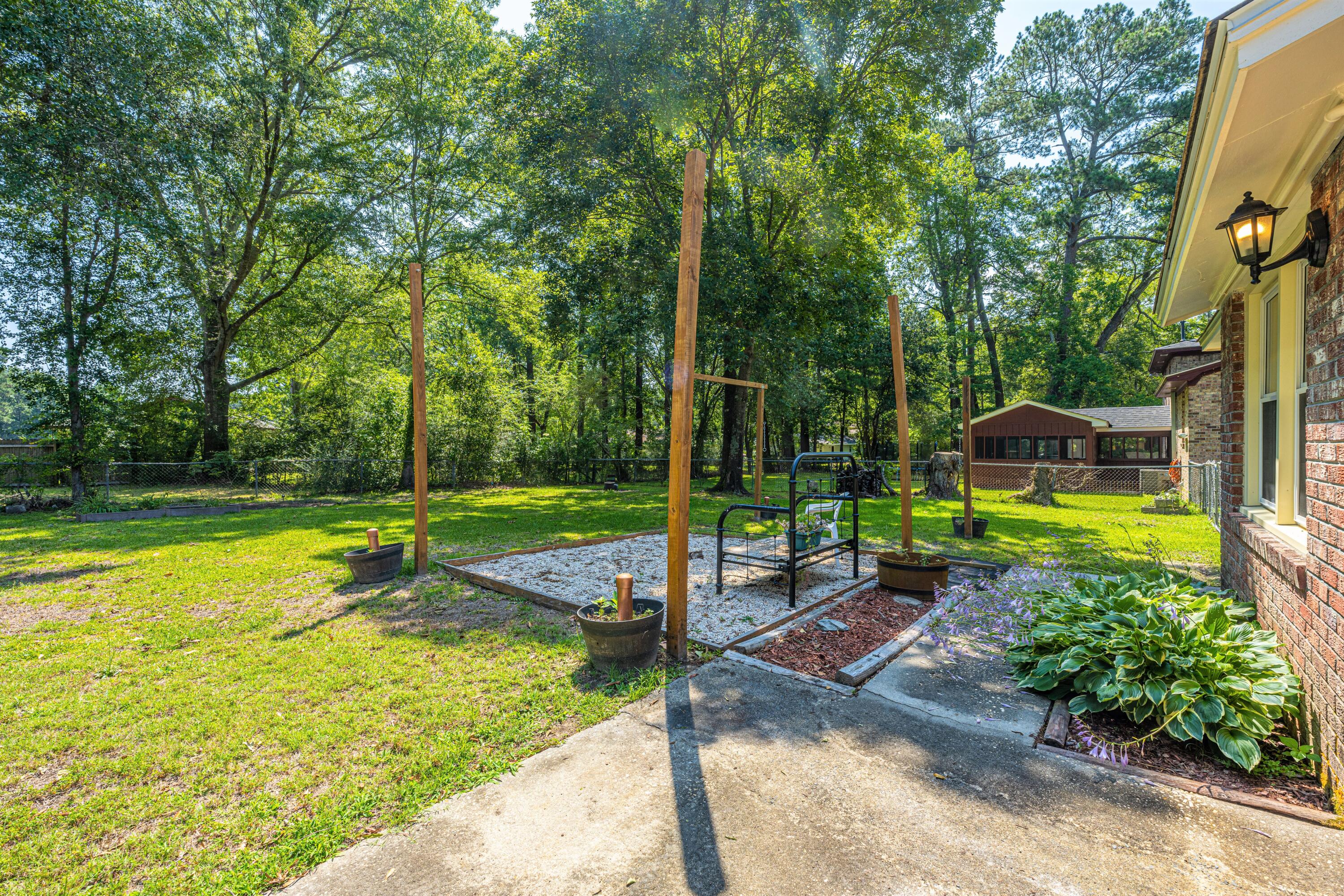 915 Miles Jamison Road Summerville, SC 29485 - Photo 30 of 34 Concrete Pad Patio