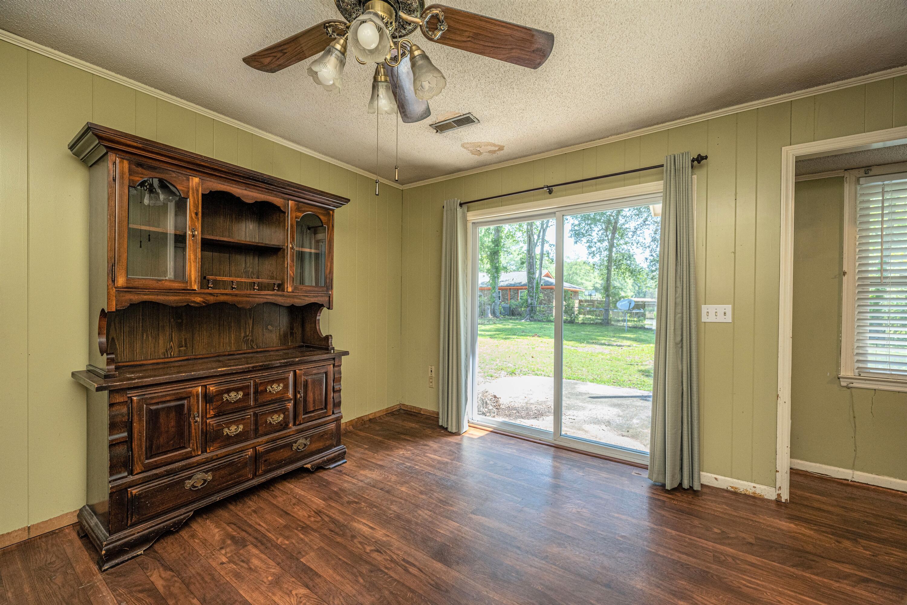 915 Miles Jamison Road Summerville, SC 29485 - Photo 7 of 34 Dining room leading to back yard