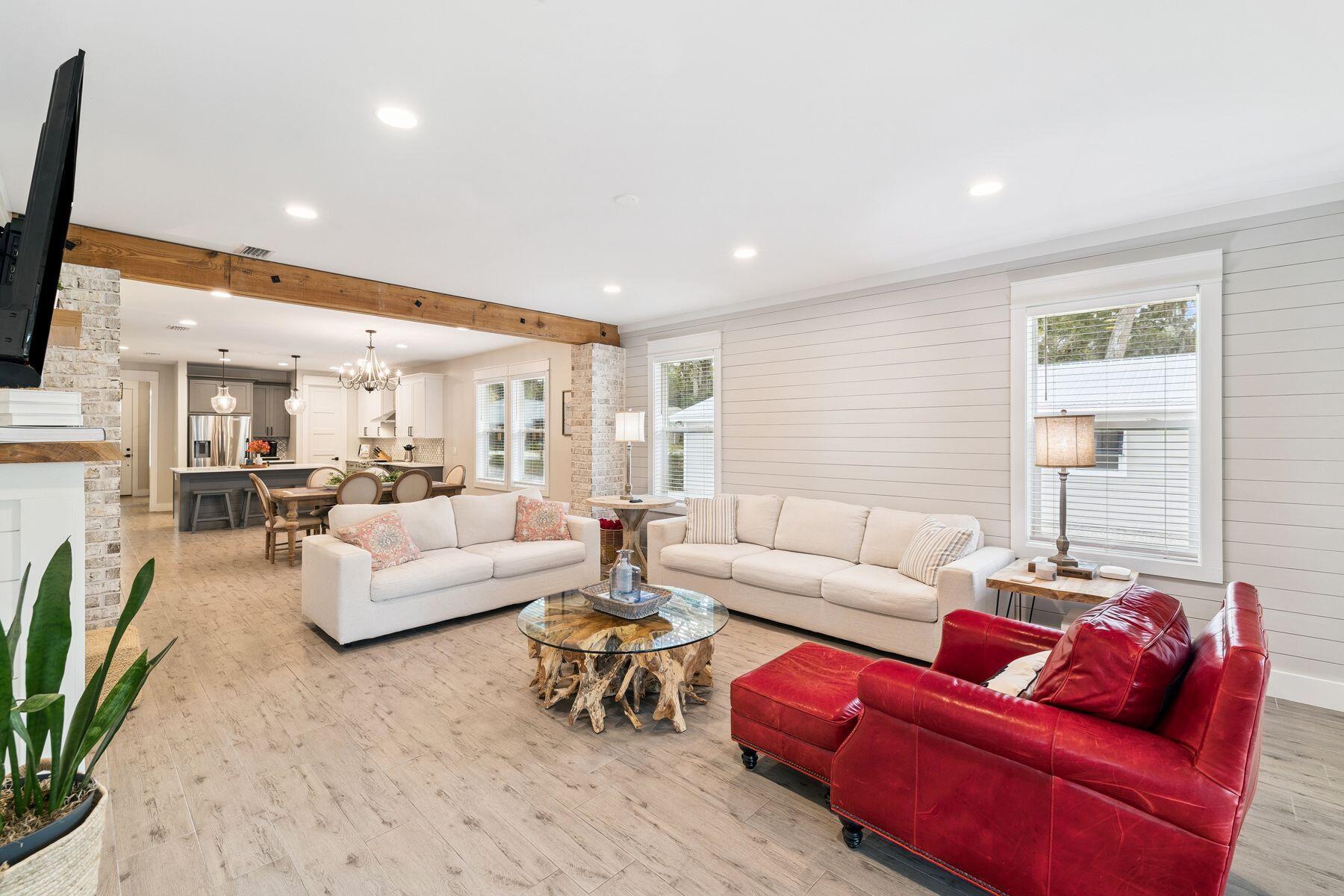 934 Bay Grove Road Freeport, FL 32439 - Photo 18 of 37 a living room with furniture and a flat screen tv