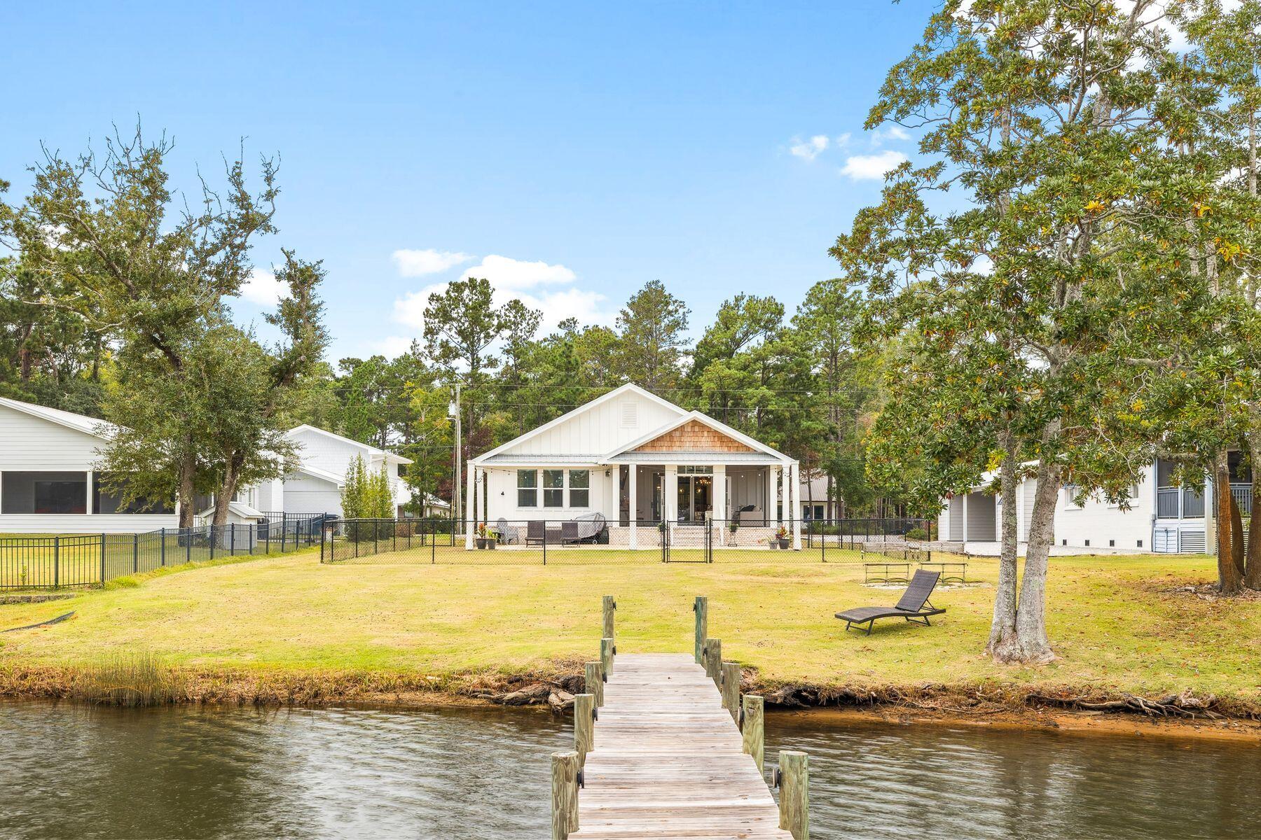 934 Bay Grove Road Freeport, FL 32439 - Photo 34 of 37 a view of a swimming pool with an outdoor space