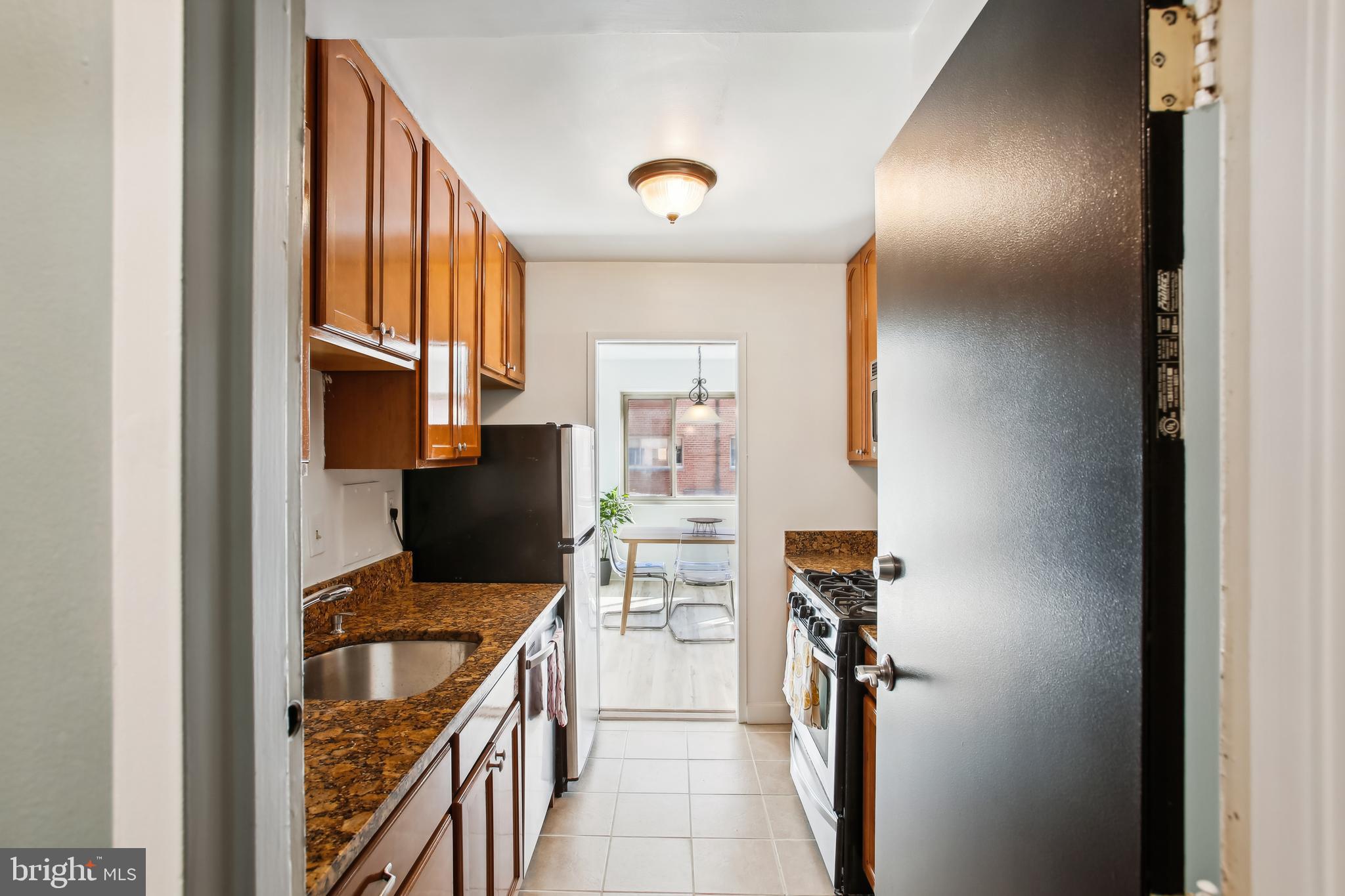 3900 Tunlaw Road Northwest, Unit 420 Washington, DC 20007 - Photo 15 of 34 Separate kitchen entrance