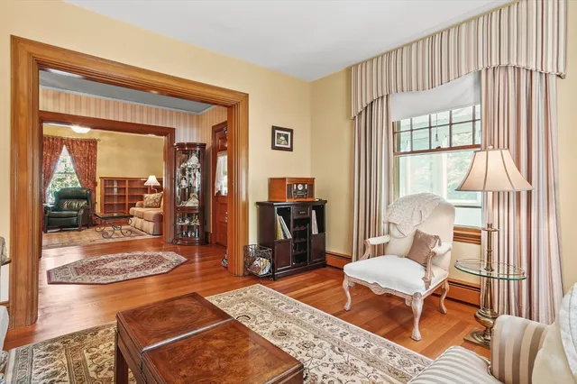 a living room with furniture and a rug