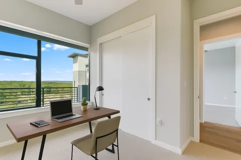 a view of a workspace with a window