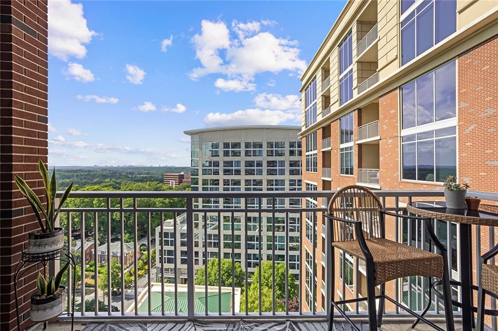 1820 Peachtree Road Northwest, Unit 1509 Atlanta, GA 30309 - Photo 32 of 61 a view of a balcony with a lake view