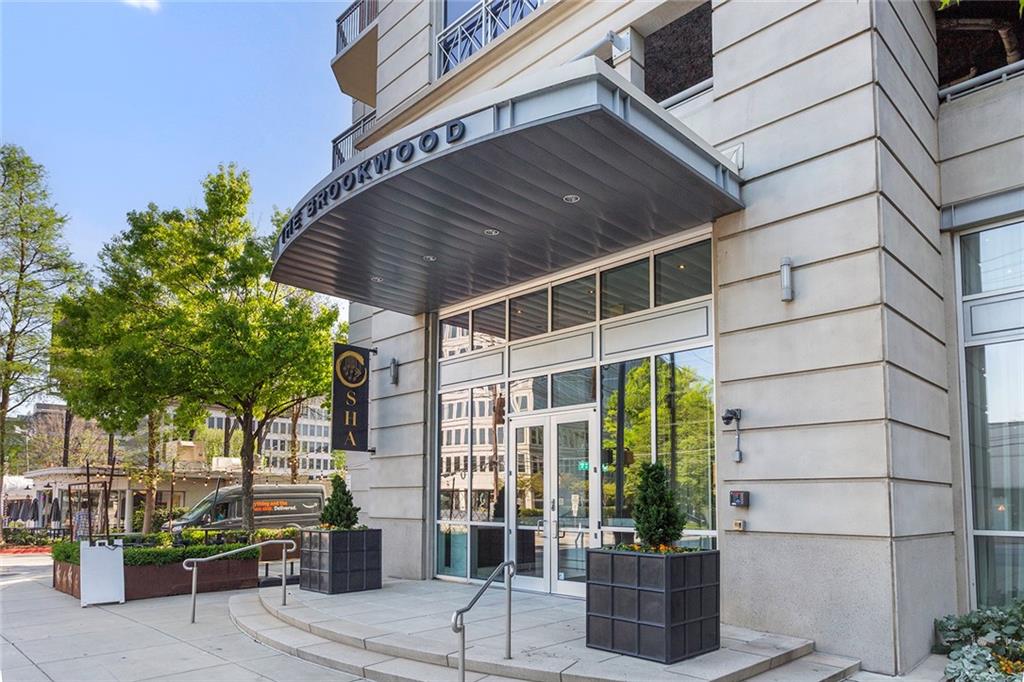 1820 Peachtree Road Northwest, Unit 1509 Atlanta, GA 30309 - Photo 41 of 61 a front view of a building with outdoor seating