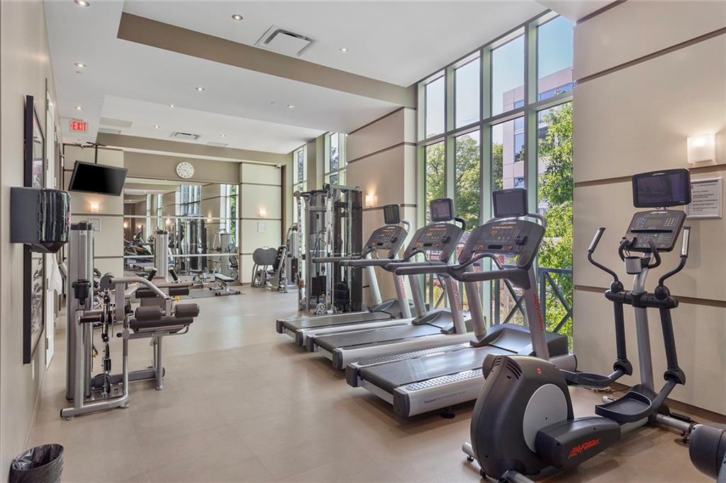 1820 Peachtree Road Northwest, Unit 1509 Atlanta, GA 30309 - Photo 51 of 61 a view of a room with gym equipment