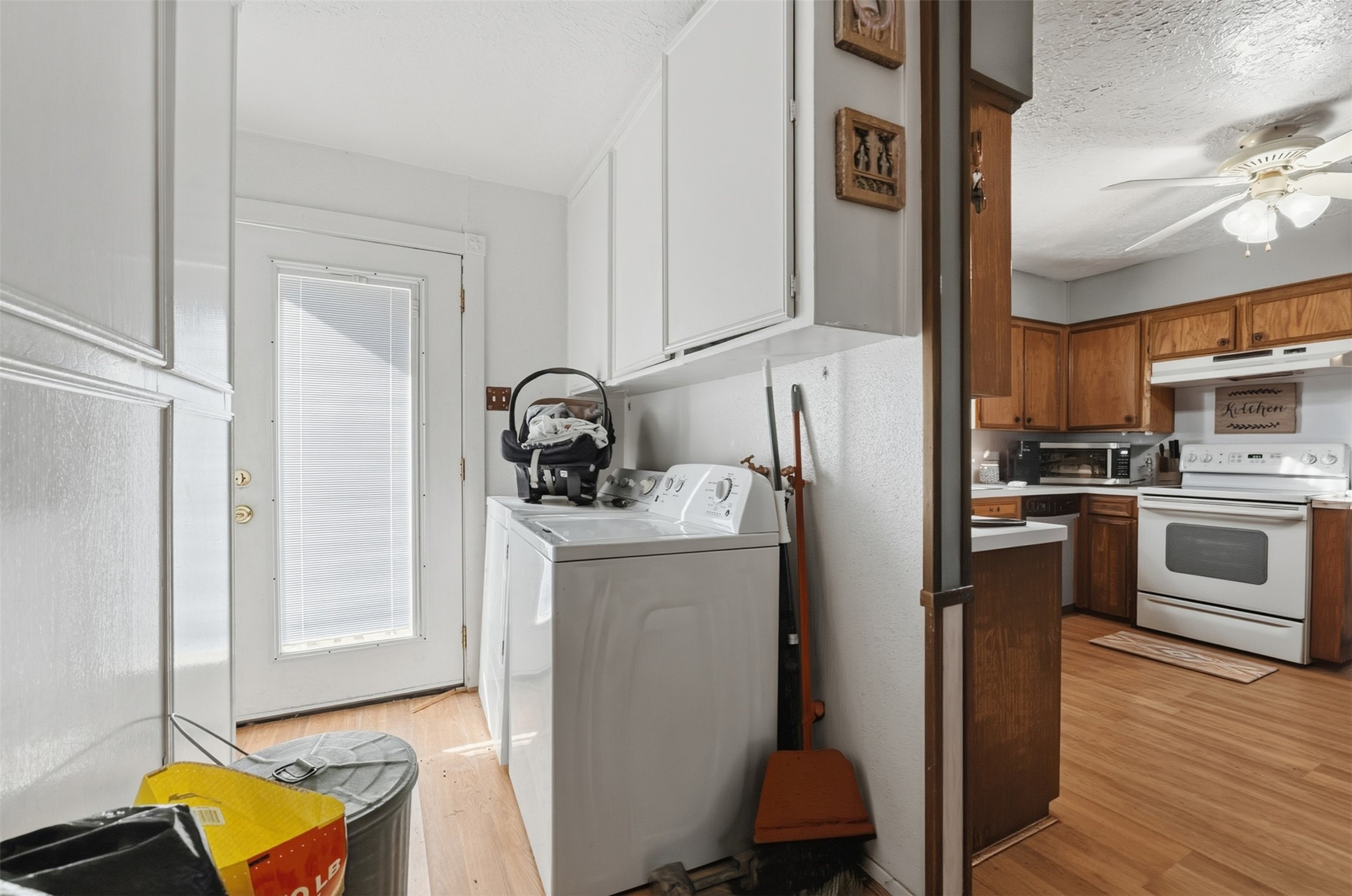 4027 Spring Branch Road Montgomery, TX 77316 - Photo 14 of 32 a kitchen with refrigerator and cabinets