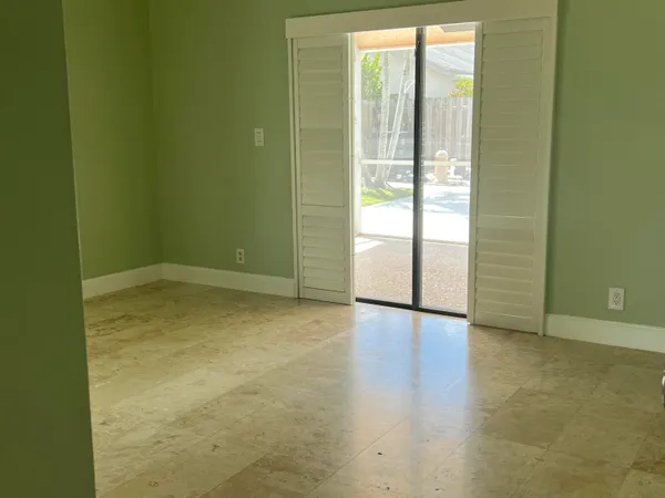 a bathroom with a double vanity sink and a toilet