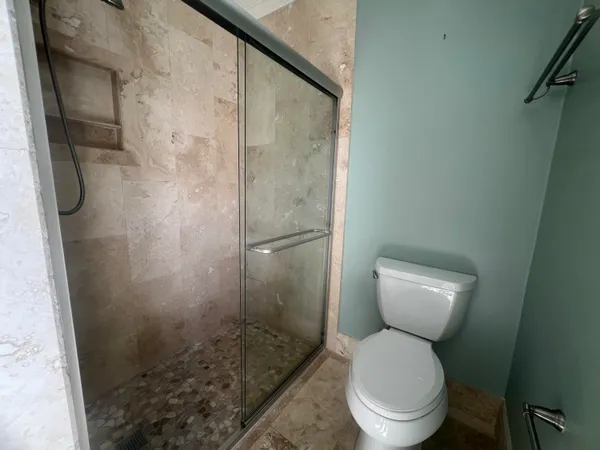 a view of an empty walk in closet