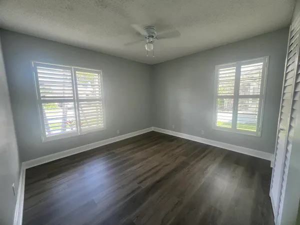 front view of a house with a small yard