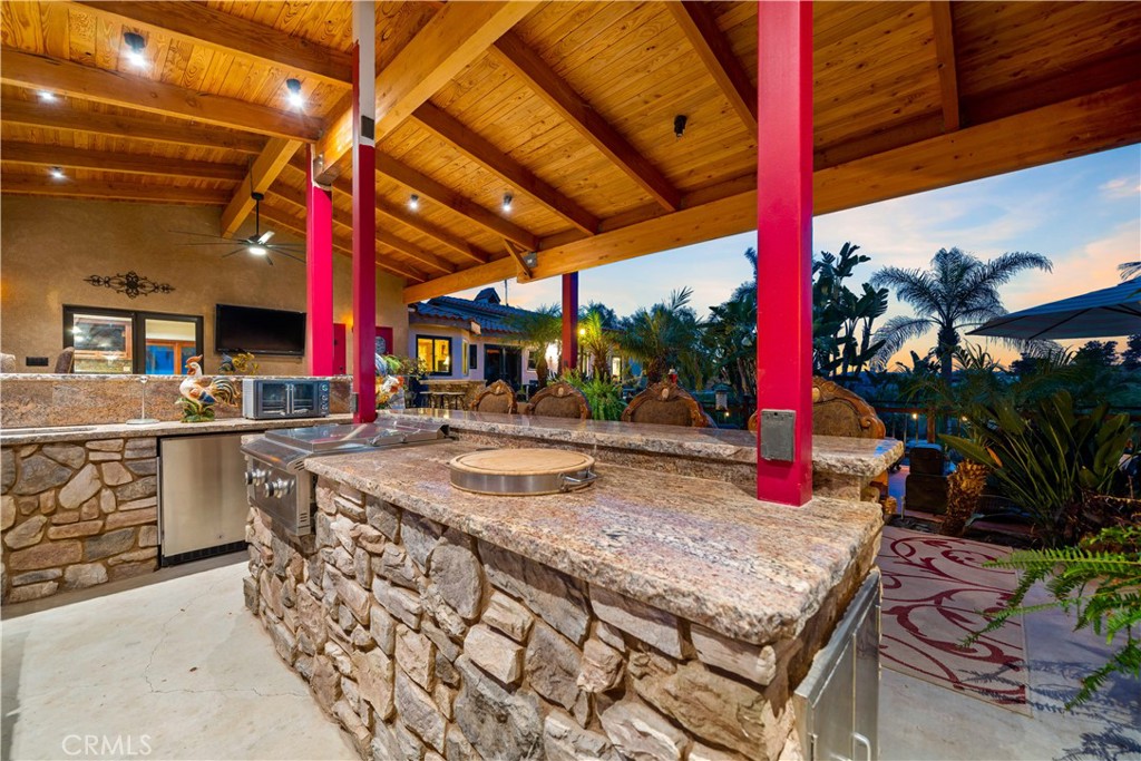 40430 Parado Del Sol Drive Temecula, CA 92592 - Photo 14 of 75 a outdoor space with lots of wooden furniture