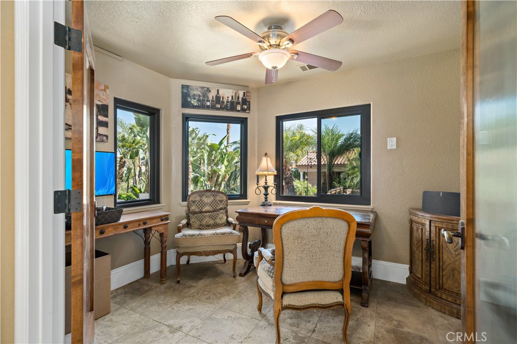 40430 Parado Del Sol Drive Temecula, CA 92592 - Photo 23 of 75 a living room with furniture and a window