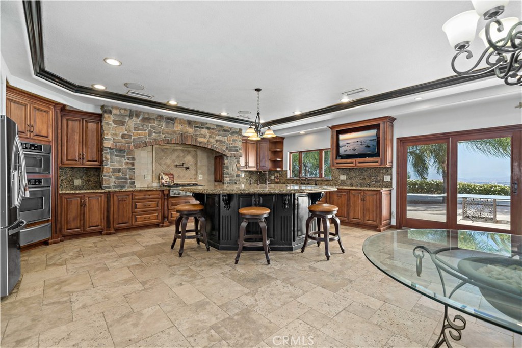 40430 Parado Del Sol Drive Temecula, CA 92592 - Photo 25 of 75 a view of a dining room with furniture