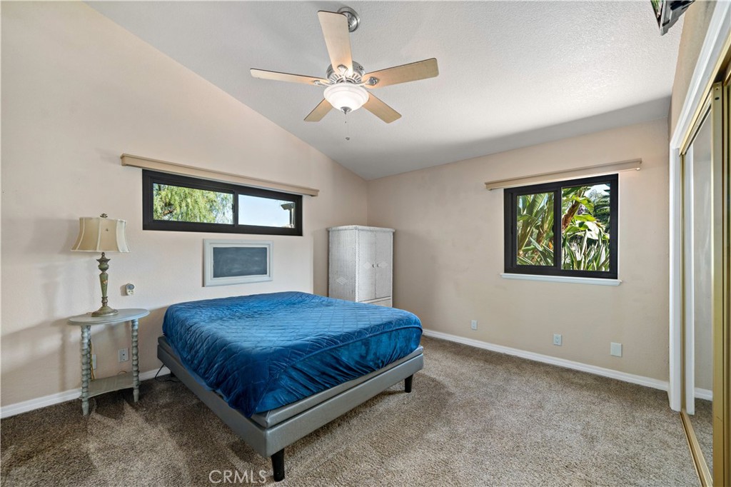 40430 Parado Del Sol Drive Temecula, CA 92592 - Photo 36 of 75 a bedroom with a bed and a painting on the wall