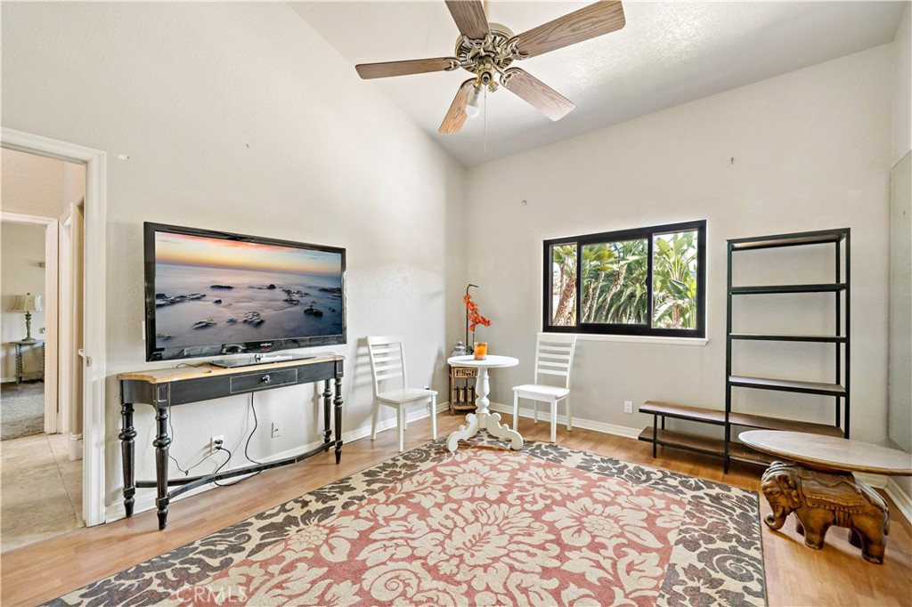 40430 Parado Del Sol Drive Temecula, CA 92592 - Photo 39 of 75 a living room with furniture a rug and white walls