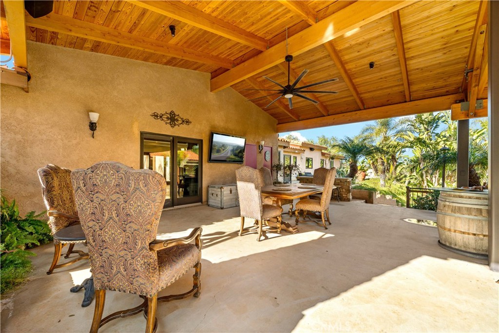 40430 Parado Del Sol Drive Temecula, CA 92592 - Photo 46 of 75 a view of a patio with a table and chairs