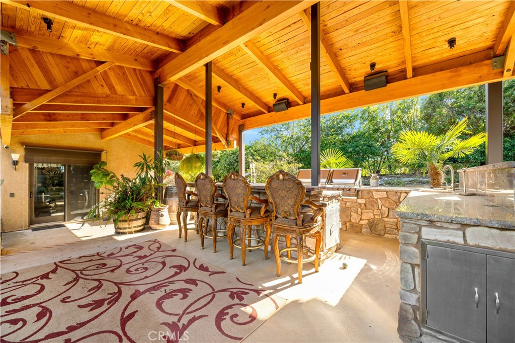 40430 Parado Del Sol Drive Temecula, CA 92592 - Photo 48 of 75 a view of a swimming pool with a patio