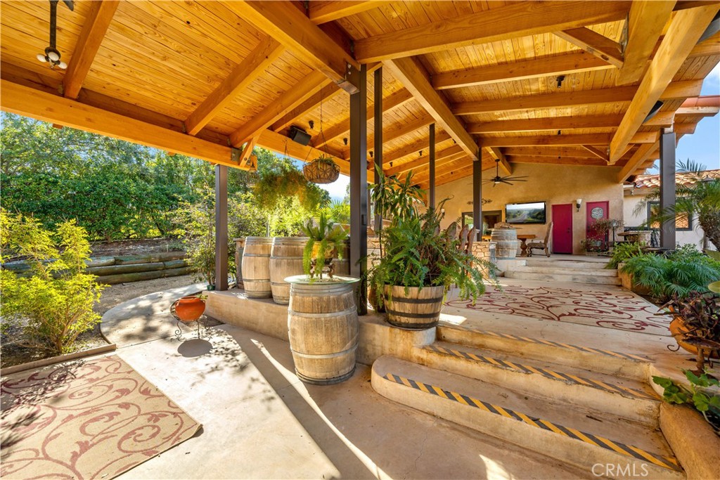 40430 Parado Del Sol Drive Temecula, CA 92592 - Photo 52 of 75 a building outdoor space with patio furniture and potted plants