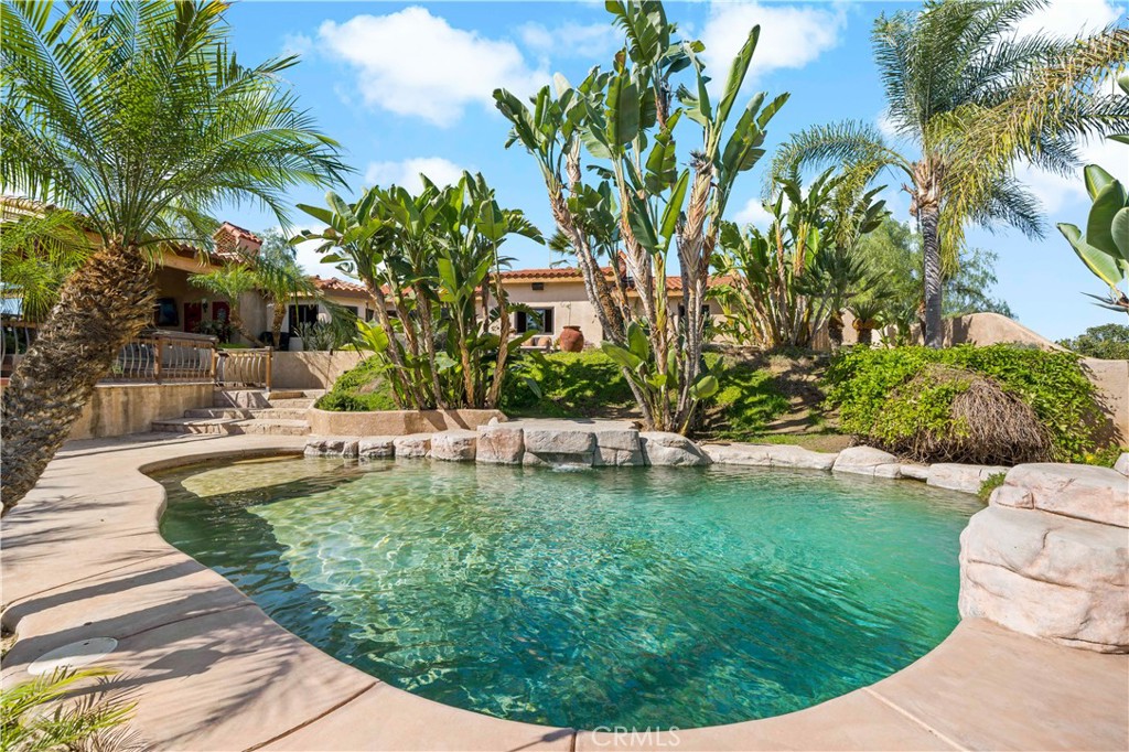 40430 Parado Del Sol Drive Temecula, CA 92592 - Photo 59 of 75 a view of a swimming pool with a patio