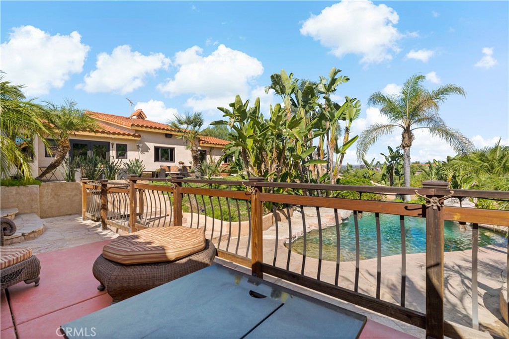 40430 Parado Del Sol Drive Temecula, CA 92592 - Photo 63 of 75 a view of a patio with swimming pool and furniture