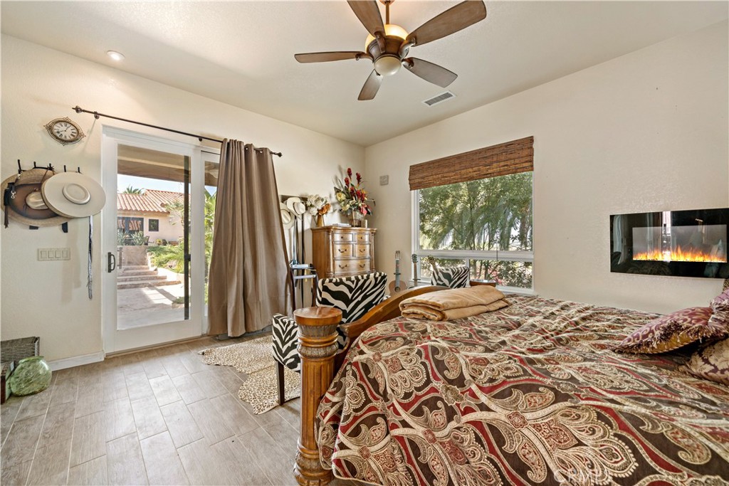 40430 Parado Del Sol Drive Temecula, CA 92592 - Photo 74 of 75 a bed sitting in a bedroom next to a window