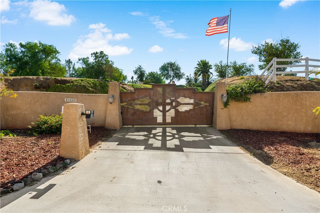 40430 Parado Del Sol Drive Temecula, CA 92592 - Photo 75 of 75 a view of a street with potted plants