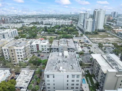 a view of city with tall buildings