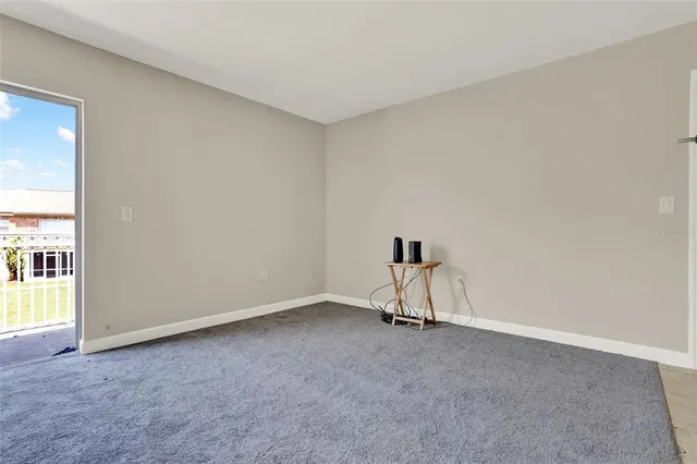 a kitchen with a sink cabinets and a refrigerator