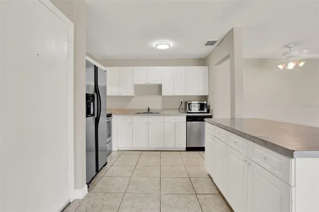 a view of a porch with wooden floor
