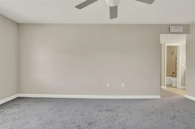 an aerial view of a house with outdoor space and street view