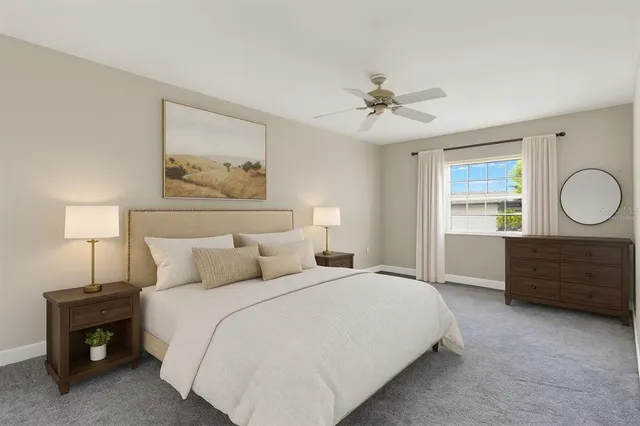 a bathroom with a sink vanity mirror and toilet
