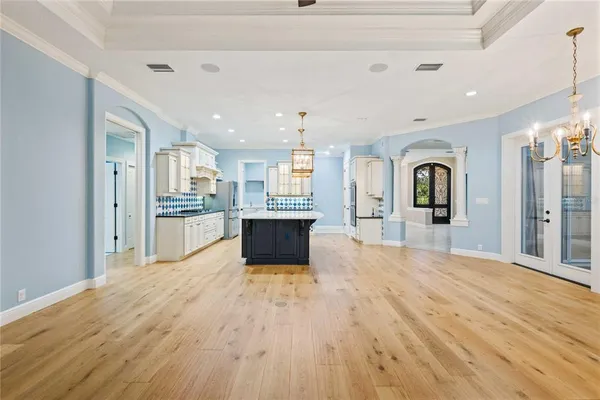 a spacious bathroom with a bathtub and a sink
