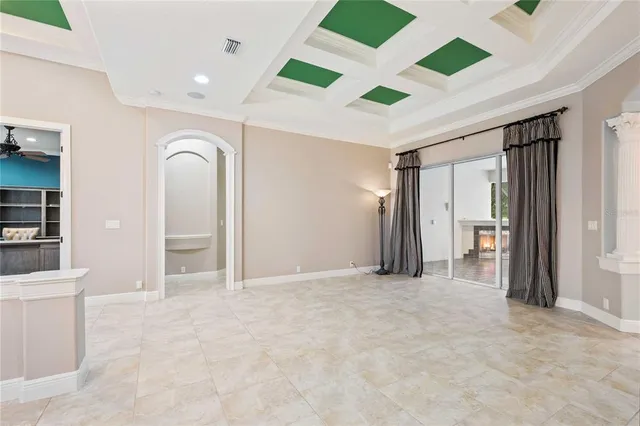 a large kitchen with stainless steel appliances kitchen island granite countertop a lot of counter space and a sink