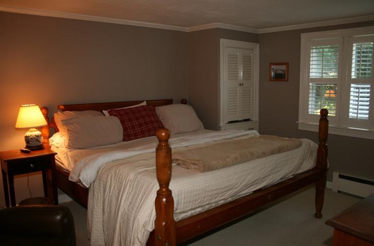 138 Long Road Harwich, MA 02645 - Photo 22 of 33 a bed sitting in a bedroom next to a window
