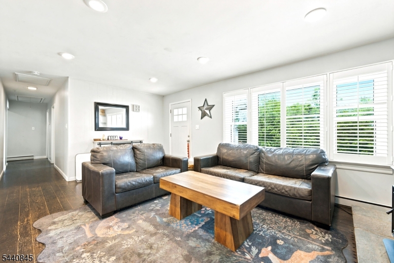 36 Forest Road Andover, NJ 07821 - Photo 50 of 50 a living room with furniture and a large window