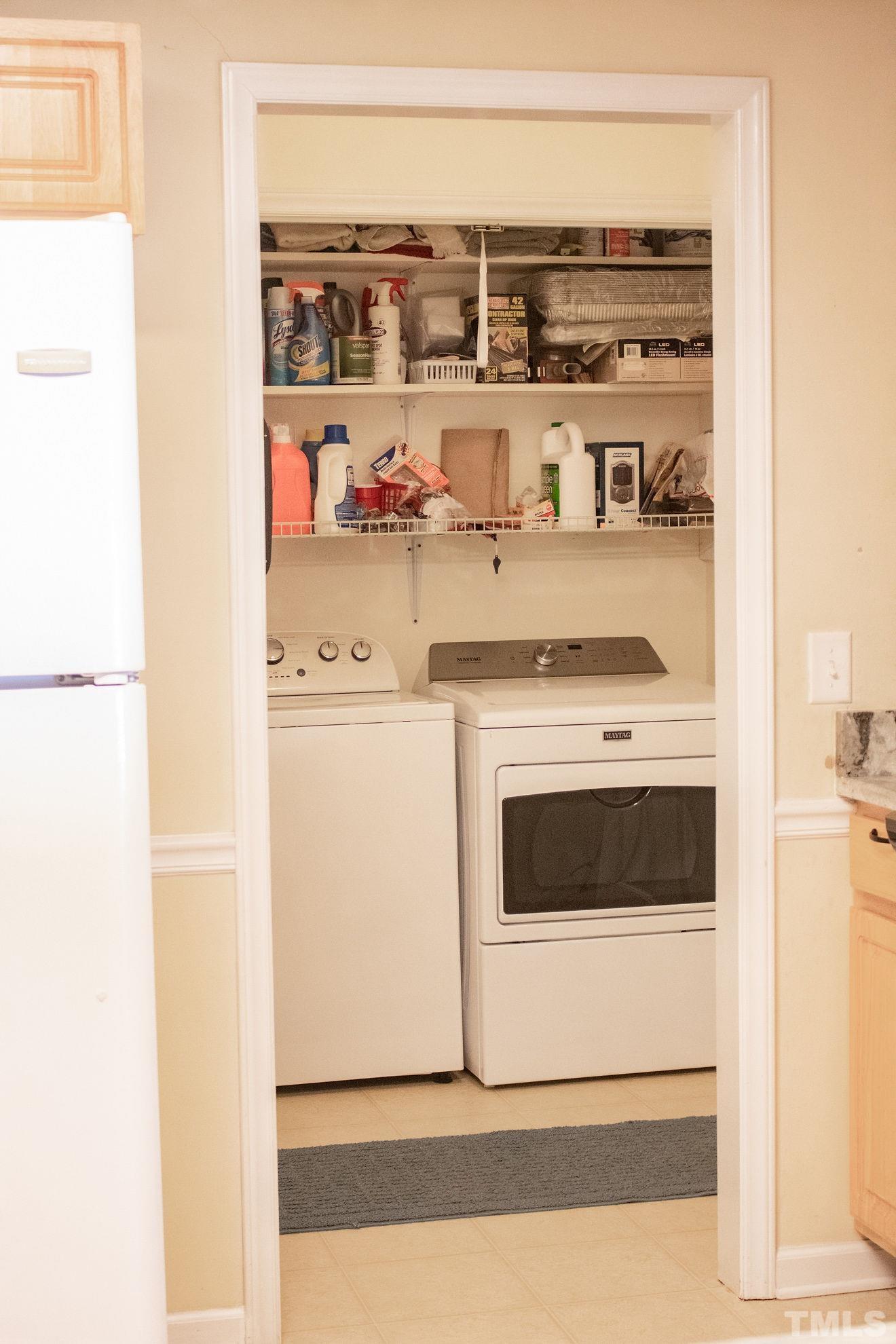 260 Waters Edge Loop Henderson, NC 27537 - Photo 26 of 38 a utility room with washer and dryer